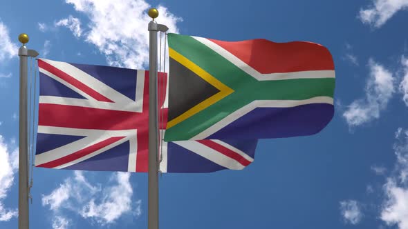 United Kingdom Flag Vs South Africa Flag On Flagpole