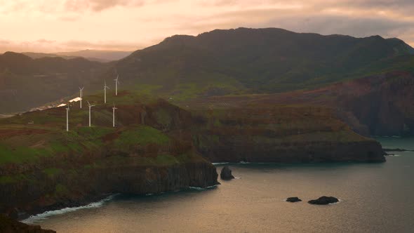 Sunset View of Wind Turbines for Energy Production at the Coast of Madeira