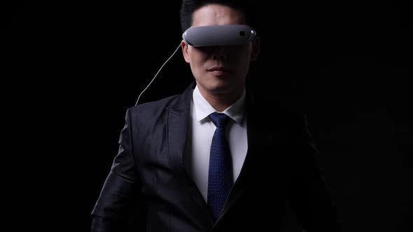 Business man wearing modern VR glasses