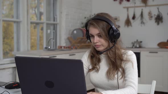 A Call Center Worker Works Remotely From Home