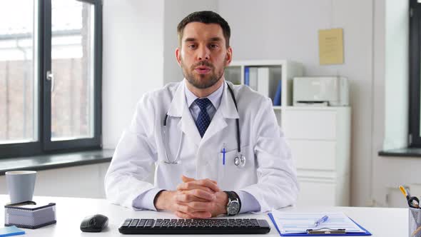 Male Doctor Having Video Conference at Hospital