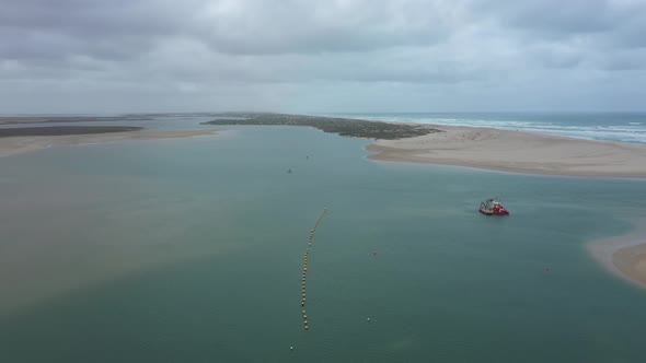 Aerial footage of the mouth of the River Murray in regional South Australia in Australia