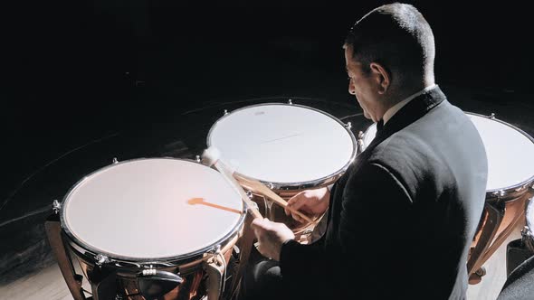 Musician Playing the Timpani