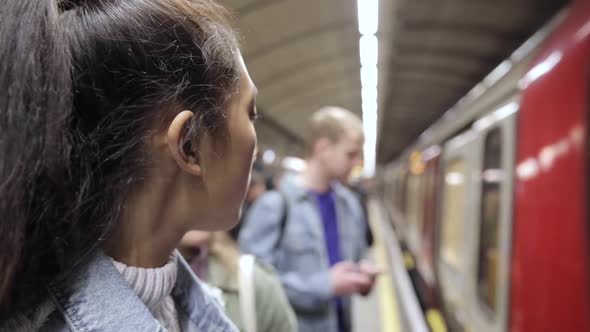 People waiting for the train at subway station