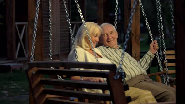 Man and Woman, Porch Swing.