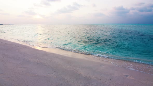 Beach in the Maldives During Mellow Sunset