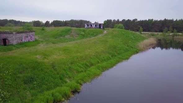 Aerial view of abandoned concrete seaside fortification building, Southern Forts near the beach of B