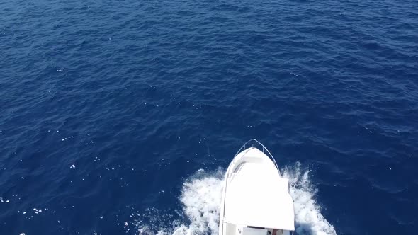 White Speed Boat Travelling And Cruising At The Gulf Of Castellammare During Summer Near The Scopell