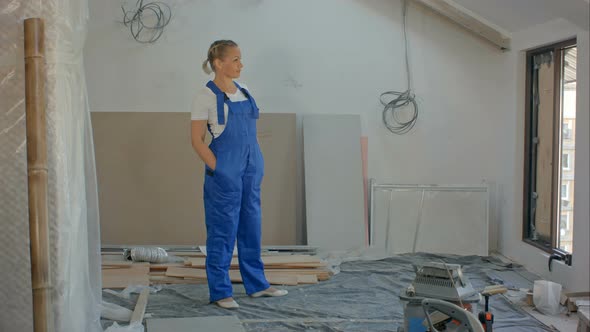 Engineer Woman at Work on Construction Site alt