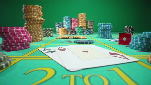 Camera Pans Over Green Gaming Table with Casino Chips Cards and Red Dice in Green Screen Chroma Key