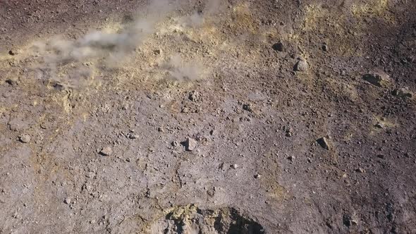 Aerial View on Volcanic Gas Exiting Through Fumaroles. Steaming Surface