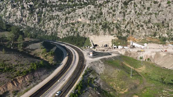 Tunnel development in the mountains aerial view 4 K