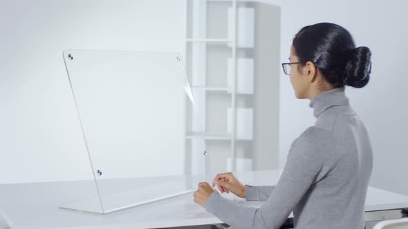 Woman Working on Invisible AR Screen