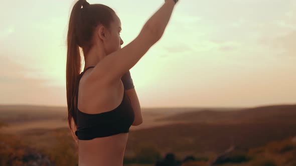 Caucasian Beautiful Athlete in Sportswear and Boxing Gloves