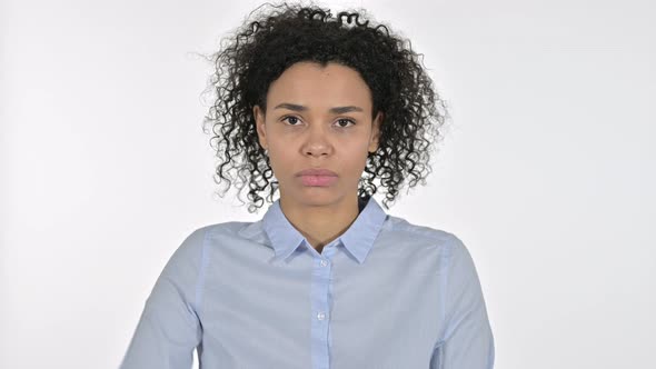 Portrait of Disappointed Young African Woman Showing Thumbs Down