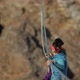 The Woman Climber Is Sent Up the Rope Across the Chasm - VideoHive Item for Sale