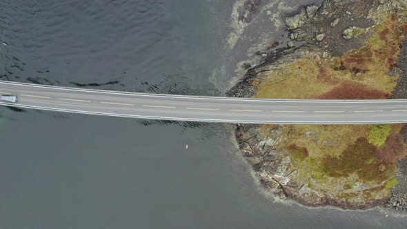 Top Down Aerial Of Car Driving at Atlantic Ocean Road In More and Romsdal, Norway. - Drone Shot, Bir