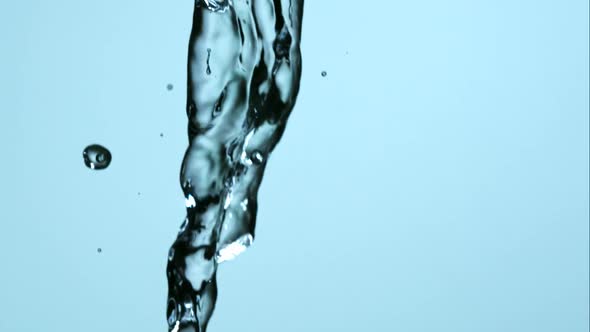 Water pouring and splashing in ultra slow motion 1500fps on a reflective surface - WATER POURS