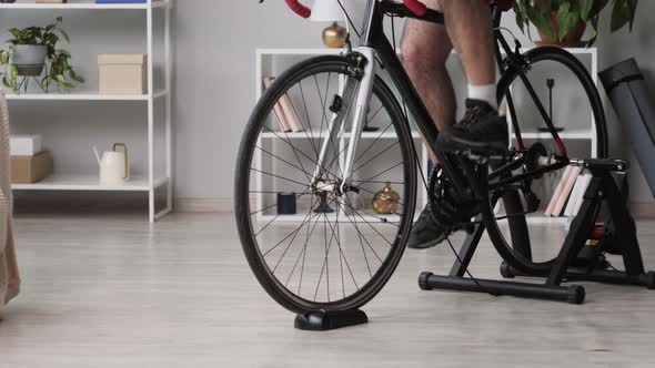 Sportsman Riding Bicycle Home Gym