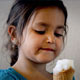 Young Girl Savoring Ice Cream - VideoHive Item for Sale