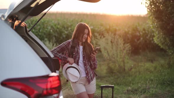 Young Woman Uses Smartphone