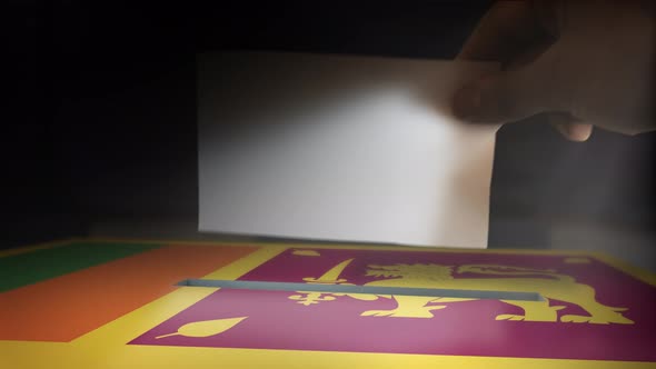 Digital Composite Hand Voting To National Flag OF Sri Lanka  alt