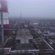 Aerial View From a Drone to a Thermal Power Plant in Cloudy Foggy Weather - VideoHive Item for Sale