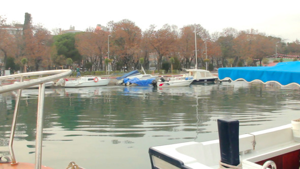 Boat Harbour With Small Boat Departing