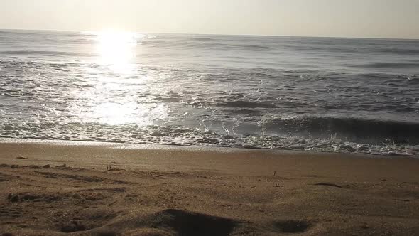 Beautiful Beach sunset, with majestic sky light being reflected. Sunrise beach. sunrise ocean waves.