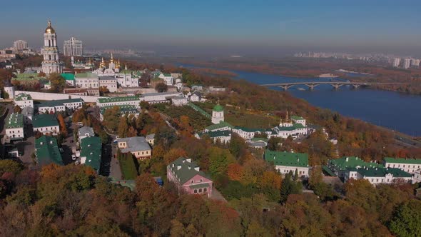 Beautiful, morning flight over the Kiev Pechersk Lavra. Autumn in Kiev. Yellow, red trees.