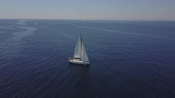 White Yacht Sail in Open Sea