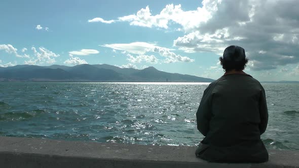 Alone Man Ederly Sitting On Seaside Looking Magic Seascape