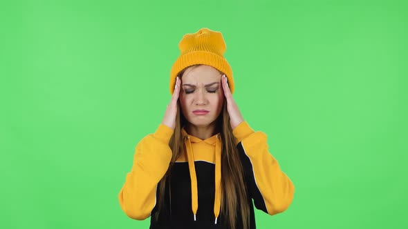 Portrait of Modern Girl in Yellow Hat Got a Cold, Sore Throat and Head, Cough