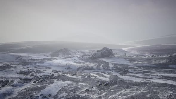 Antarctic Mountains with Snow in Fog