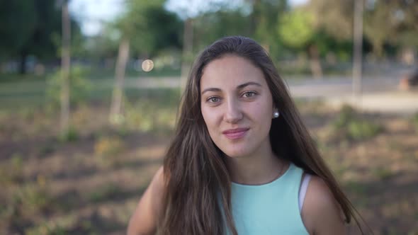 a Pretty White Girl Smiling at the Camera in Slow Motion