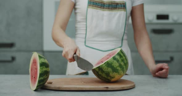 Professional Chef Woman Cut a Big Watermelon