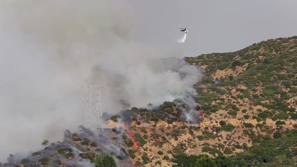 Getty Fire. View Over the Burning Area and a Fire Extinguishing Helicopter