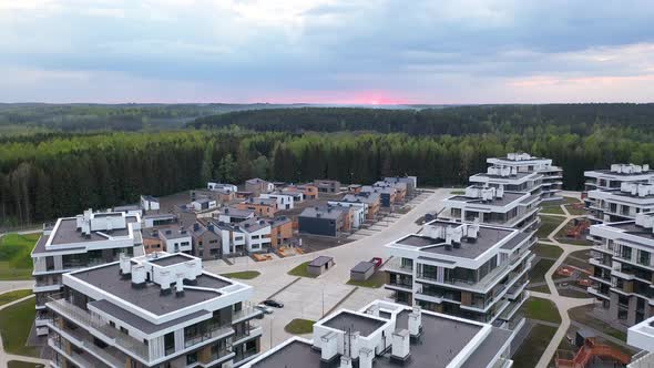 Aerial Flying Over A Respectable Area Of Houses And Villas Near The Forest