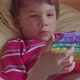 Toddler Kid Playing with the Pop It Toy Fidget - VideoHive Item for Sale