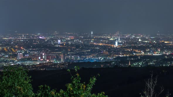 Skyline of Vienna From Danube Viewpoint Leopoldsberg Aerial Night Timelapse