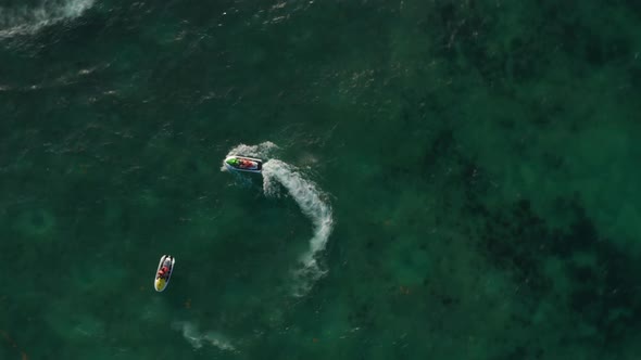 Jet Ski Circling Around Another Watercraft