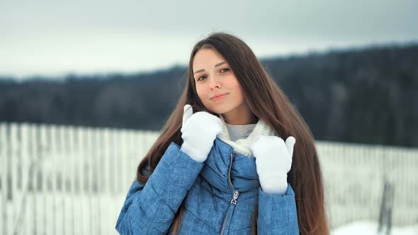 Sensual Pretty Young Woman Posing Outdoor in Winter