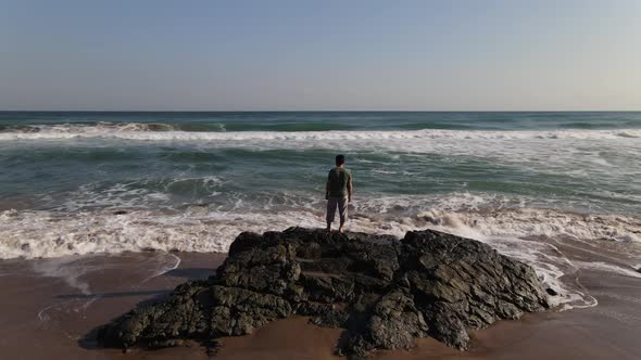 Watching Ocean Waves Rock Aerial View