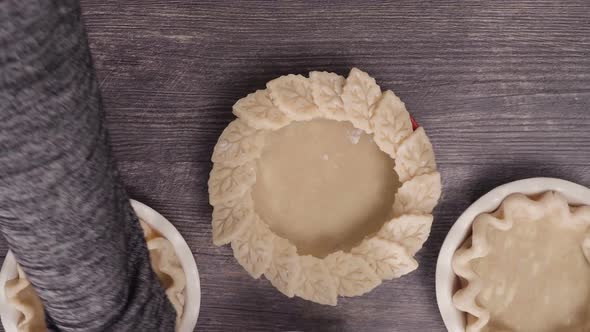 Time lapse. Preparing pie crusts for mini pumpkin pies.