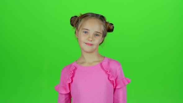 Child Is Sad, She Was Riddled with Unpleasant News. Green Screen. Slow Motion