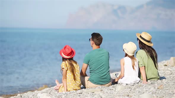 Young Family on Vacation Have a Lot of Fun