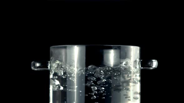 Super Slow Motion in a Transparent Pan Boils Water with Air Bubbles