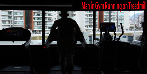 Man in Gym Running on Treadmill