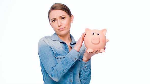 Funny Girl Holding Her Piggy Bank and Smiling