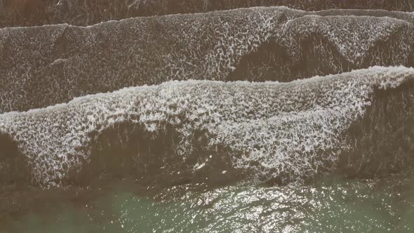 Drone view of waves and shoreline